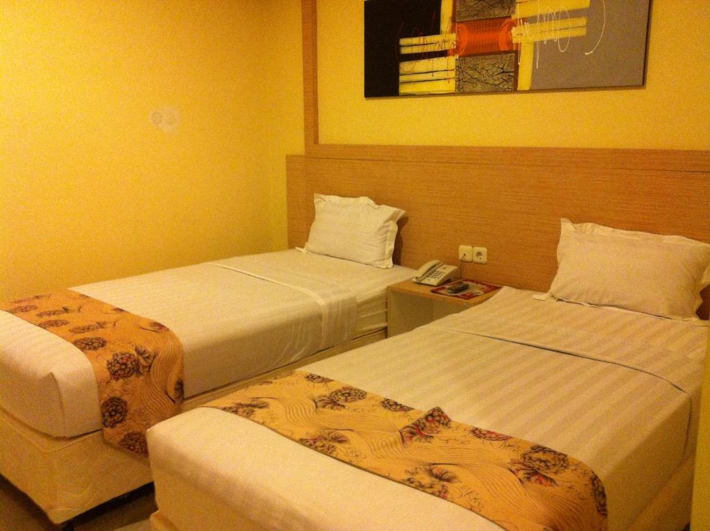 Hotel Paramount Biringkanya Quarto foto
