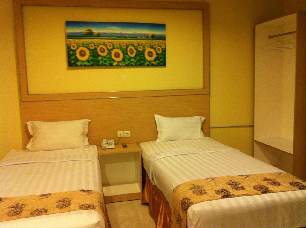Hotel Paramount Biringkanya Quarto foto